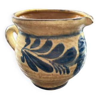 Pitcher with blue floral decor