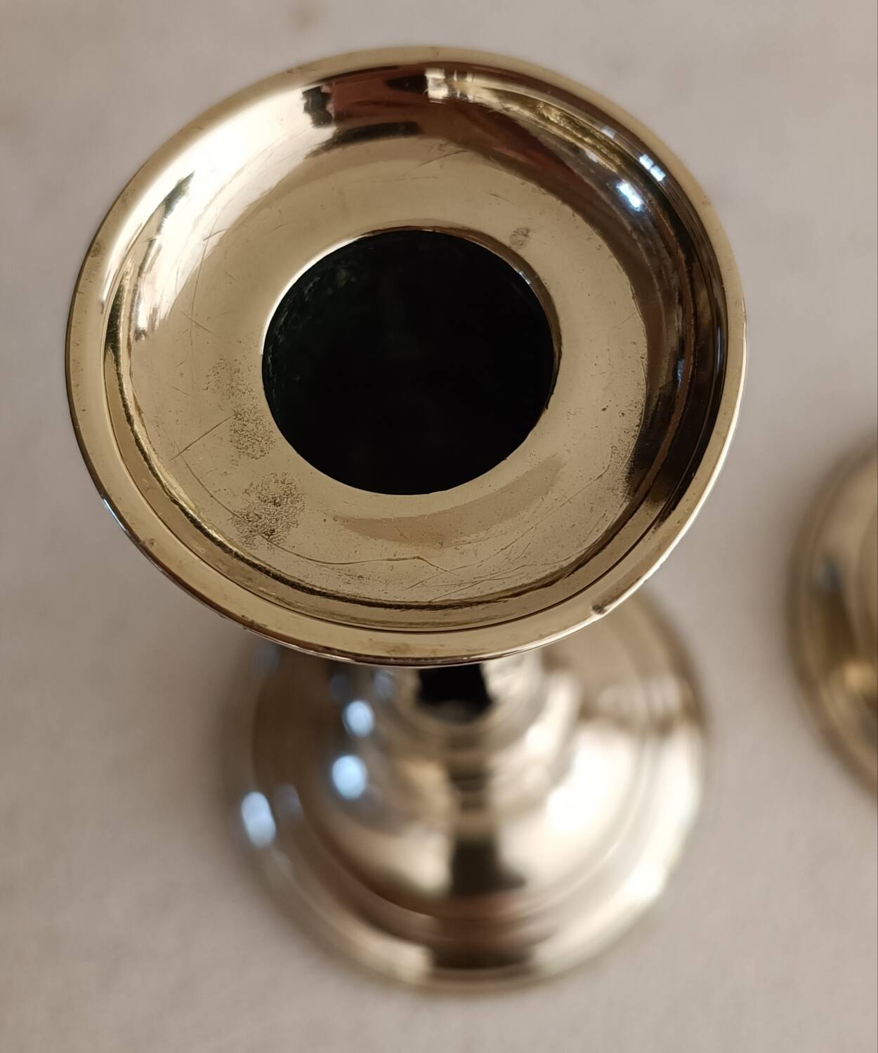 Pair of yellow copper candlesticks