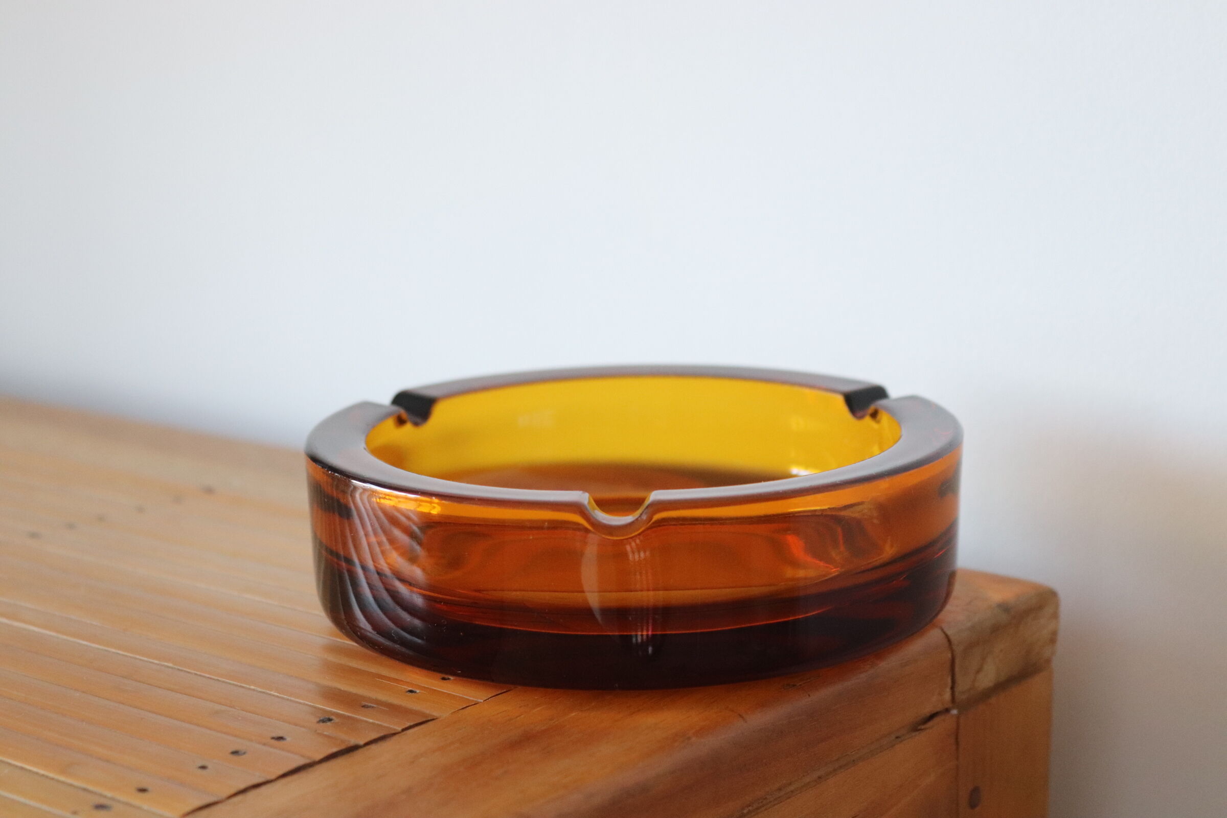 Round vintage amber glass ashtray