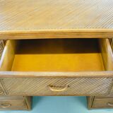 A console with split bamboo drawers