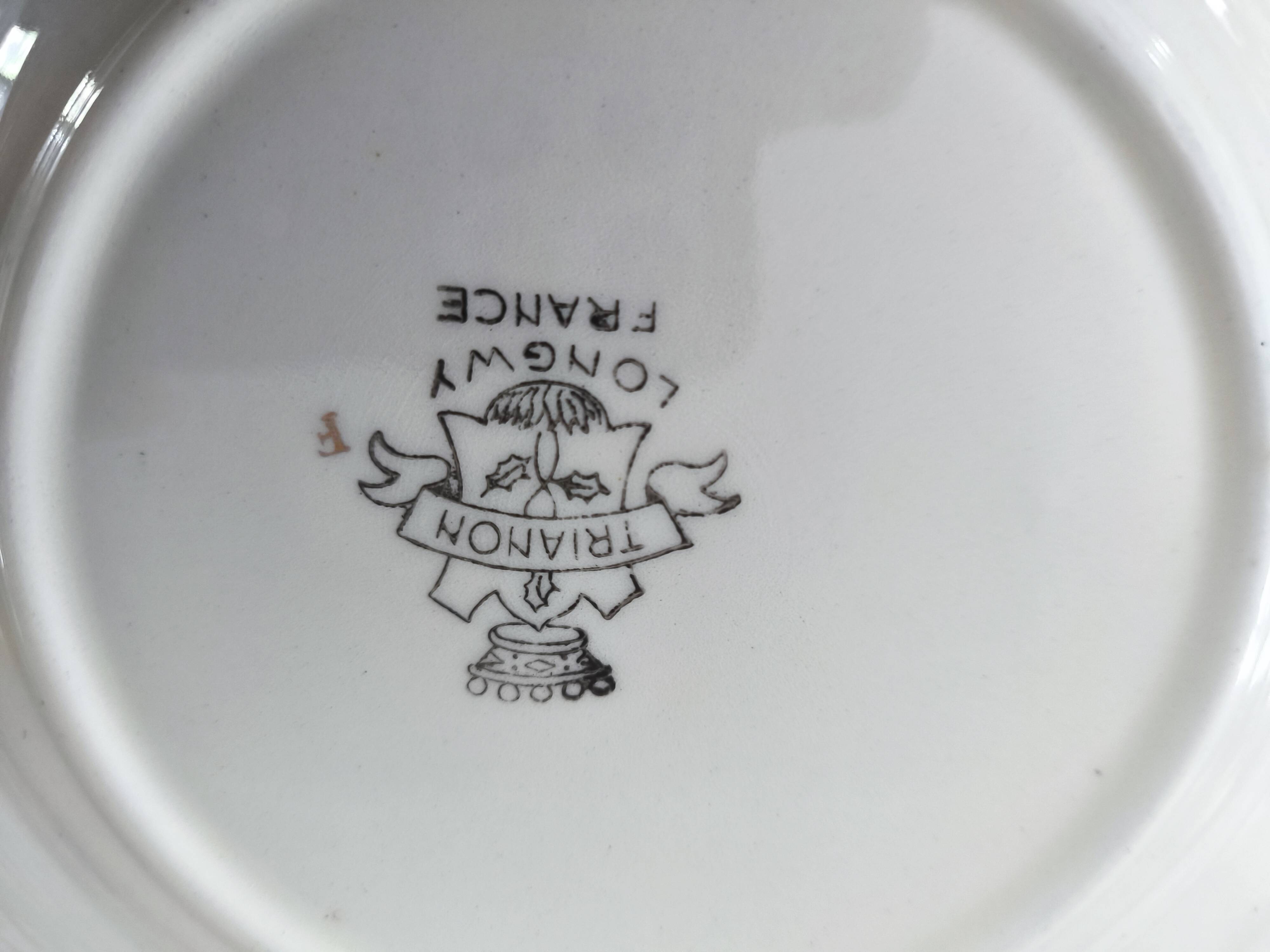 Set of 7 Longwy France earthenware dessert plates, Trianon model