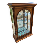 Showcase bookcase in molded and carved walnut