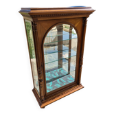 Showcase bookcase in molded and carved walnut