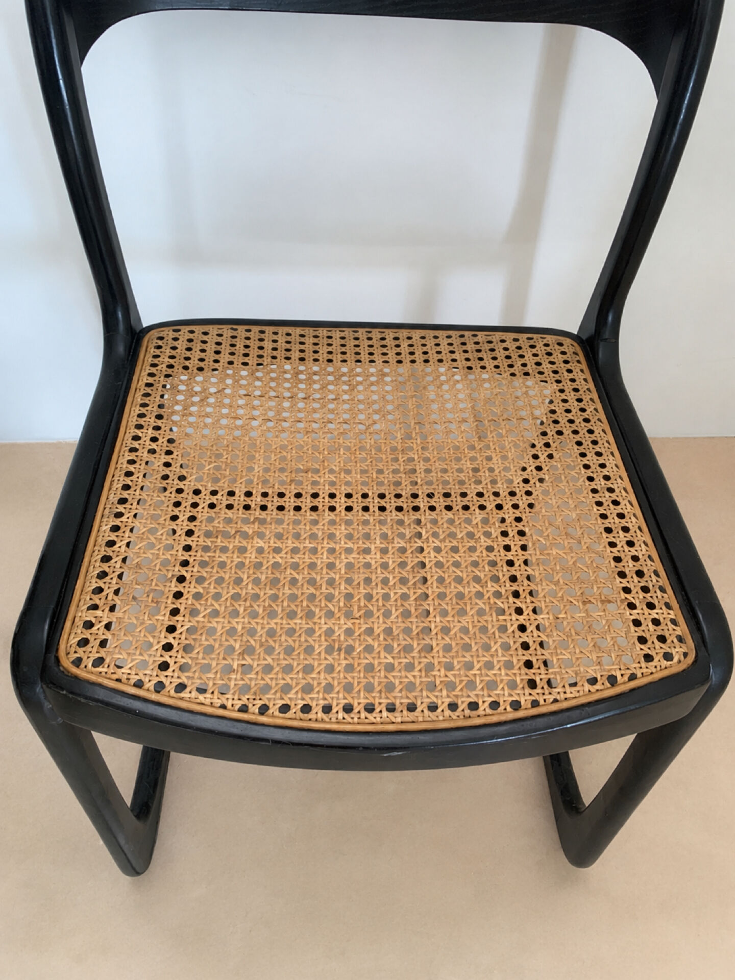 Set of 4 Baumann sled chairs with caning.