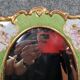 Porcelain mirror with cherub decorations circa 1900