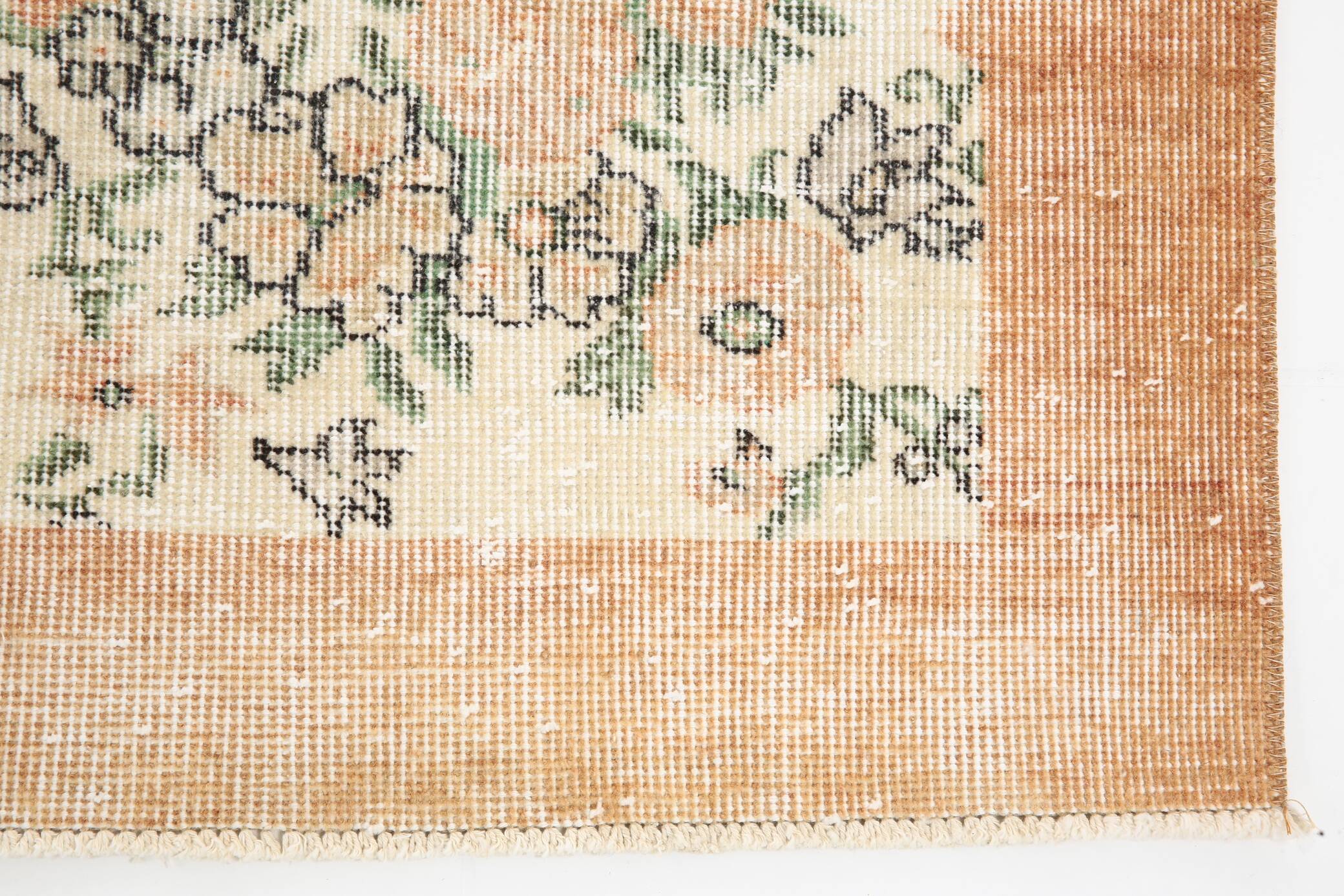 Tapis en laine et coton à décor floral
