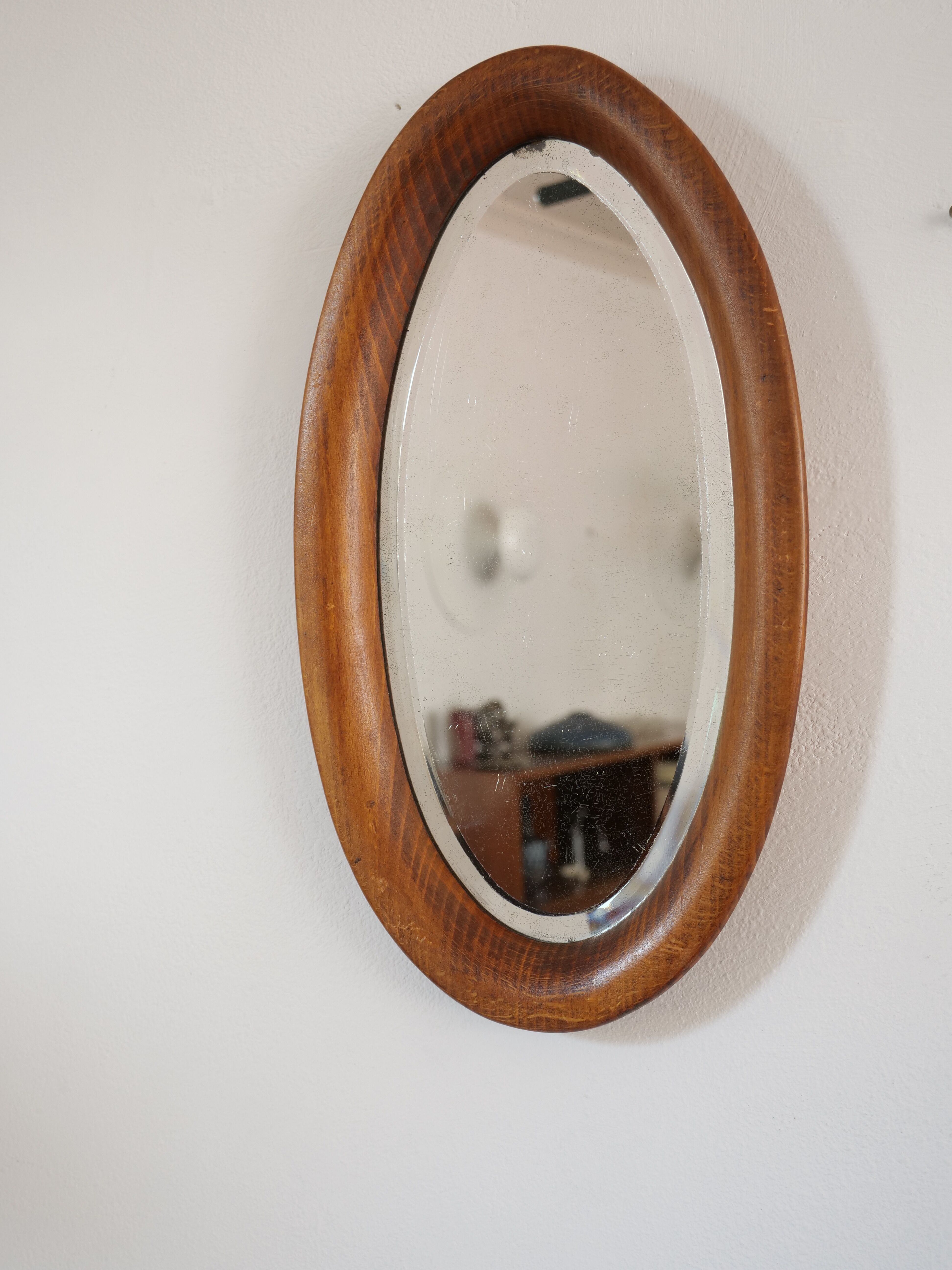 Oval mirror in artisan wood 28x49cm