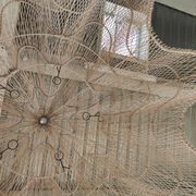 Huge rattan suspension in the shape of a corolla H:1m; D: 1m50