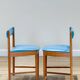 7 chaises de salle à manger McIntosh en vinyle bleu