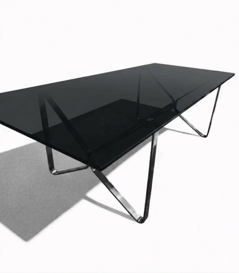 Smoked glass and chrome table design – Italian style from the 1970s.