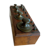 Box with old brass weight