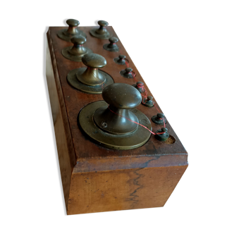 Box with old brass weight