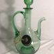 Old refreshing carafe pourer in green blown glass with vintage cap