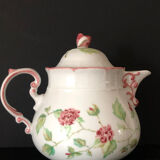 Old white and pink teapot