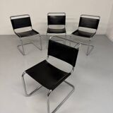 Lot of 4 tubular chairs designed by Mart Stam in vintage black leather from the 1980s.
