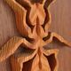 Plaque décorative en bois avec motif d'insecte