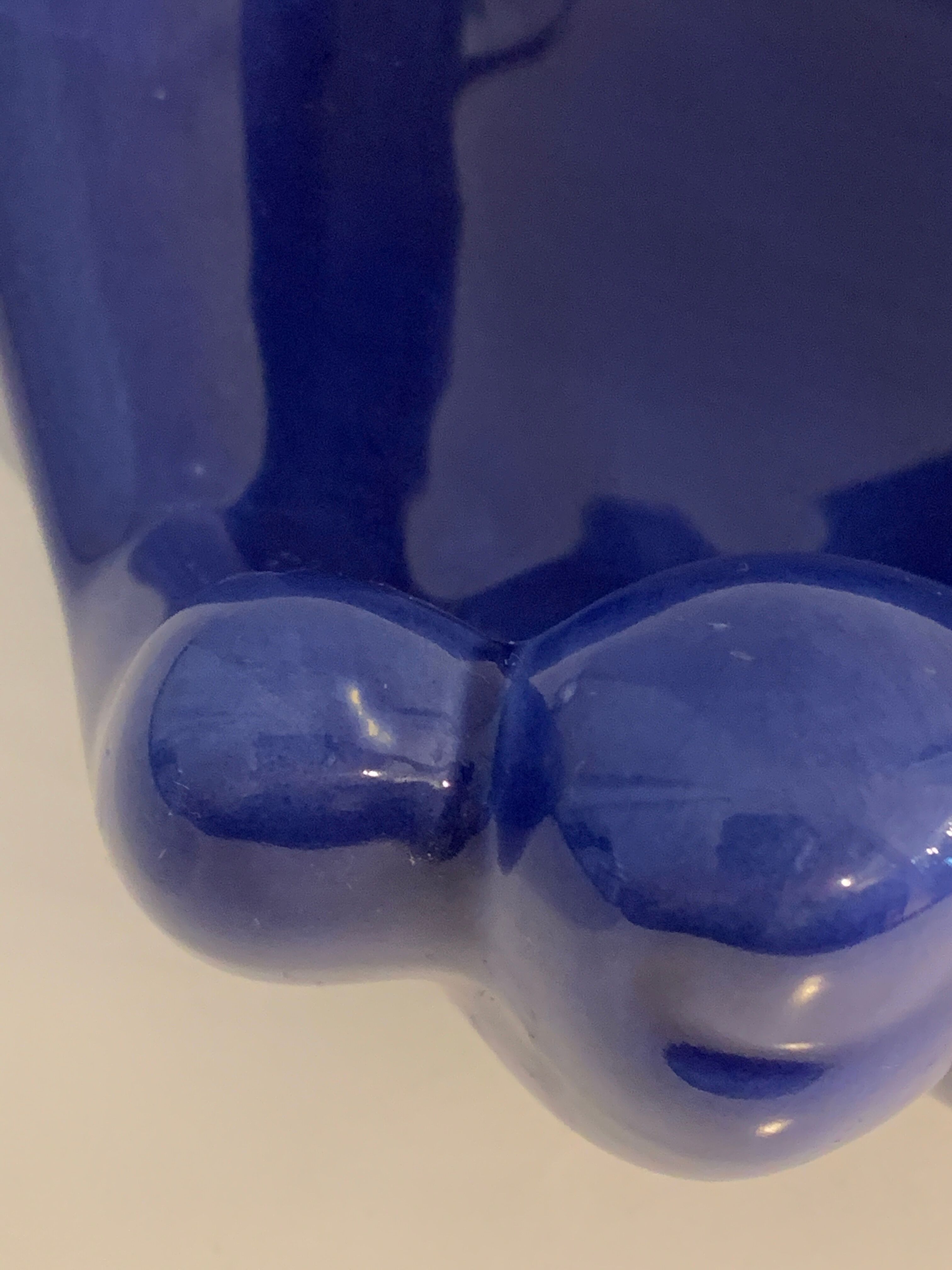 Ceramic ashtray, blue hand shape