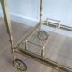 Brass rolling table from the Baguès house.