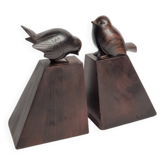 Pair of carved wooden bookends signed Dan Karner, 20th century, 15 cm