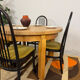 Round table with 1 extension in solid elm Regain, diameter 120 cm.