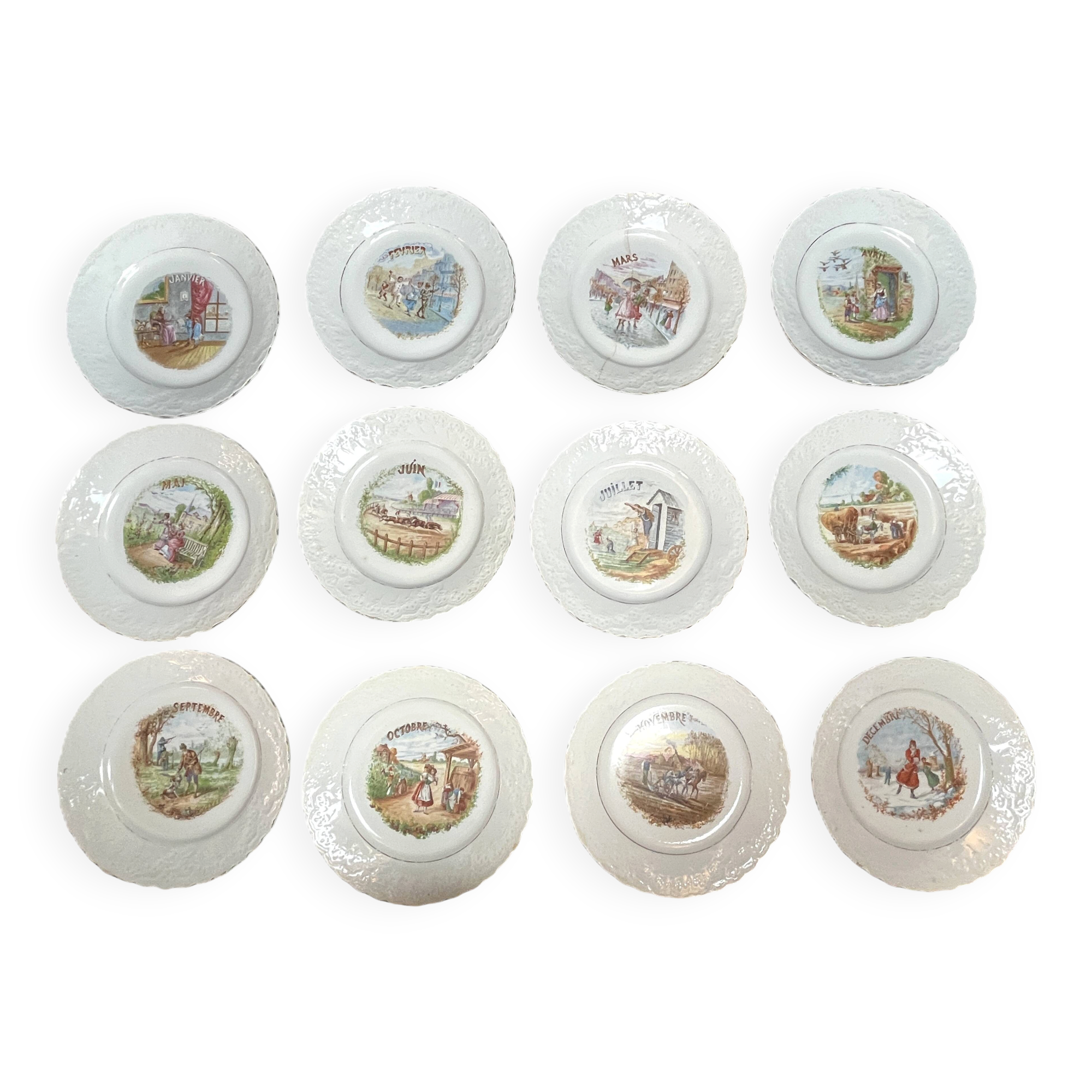 Arts de la table, douze assiettes dessert mois de l’année vers 1930