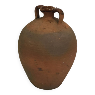 Old earthen oil jar