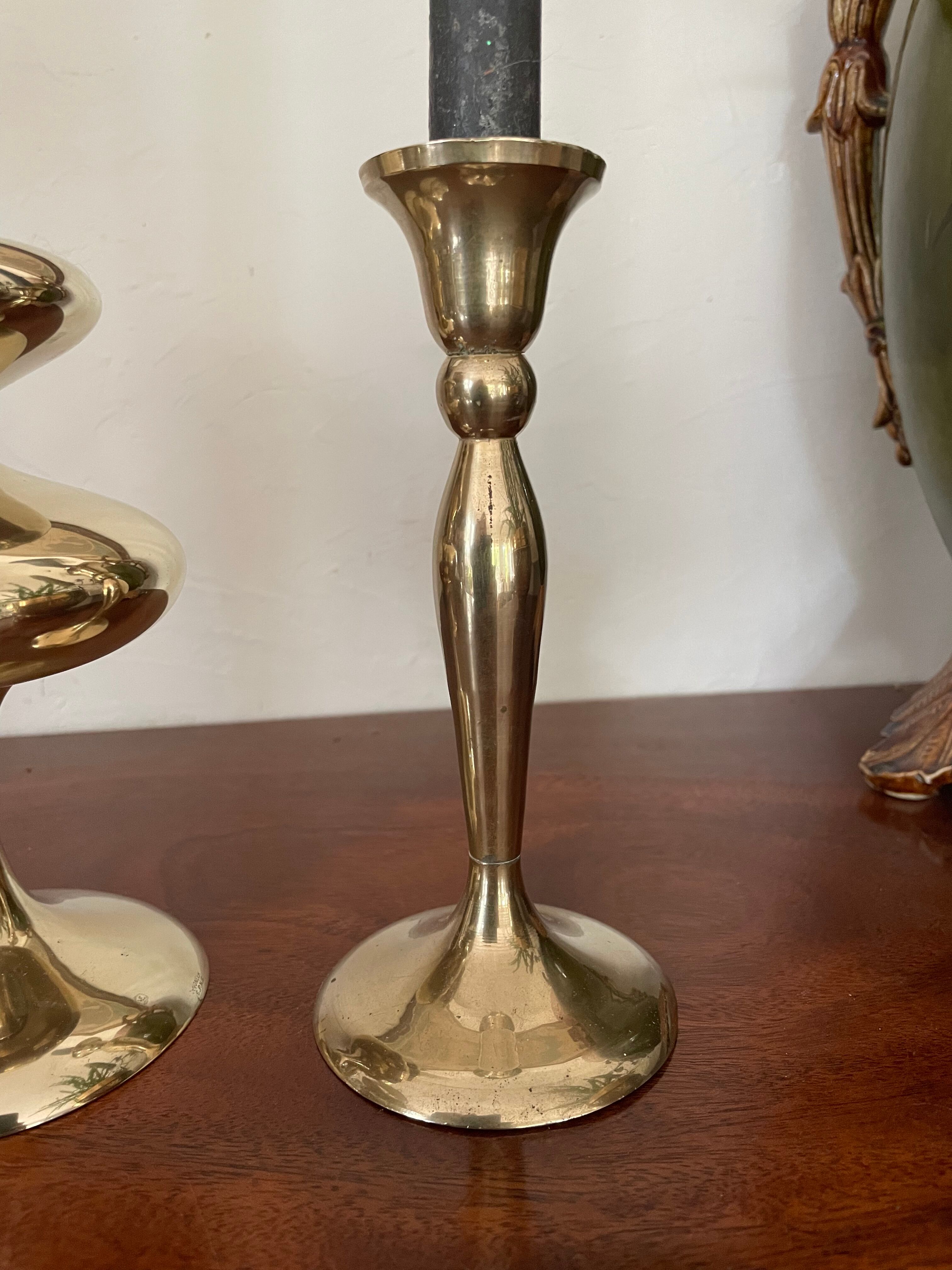 Three vintage brass candle holders