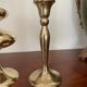 Three vintage brass candle holders