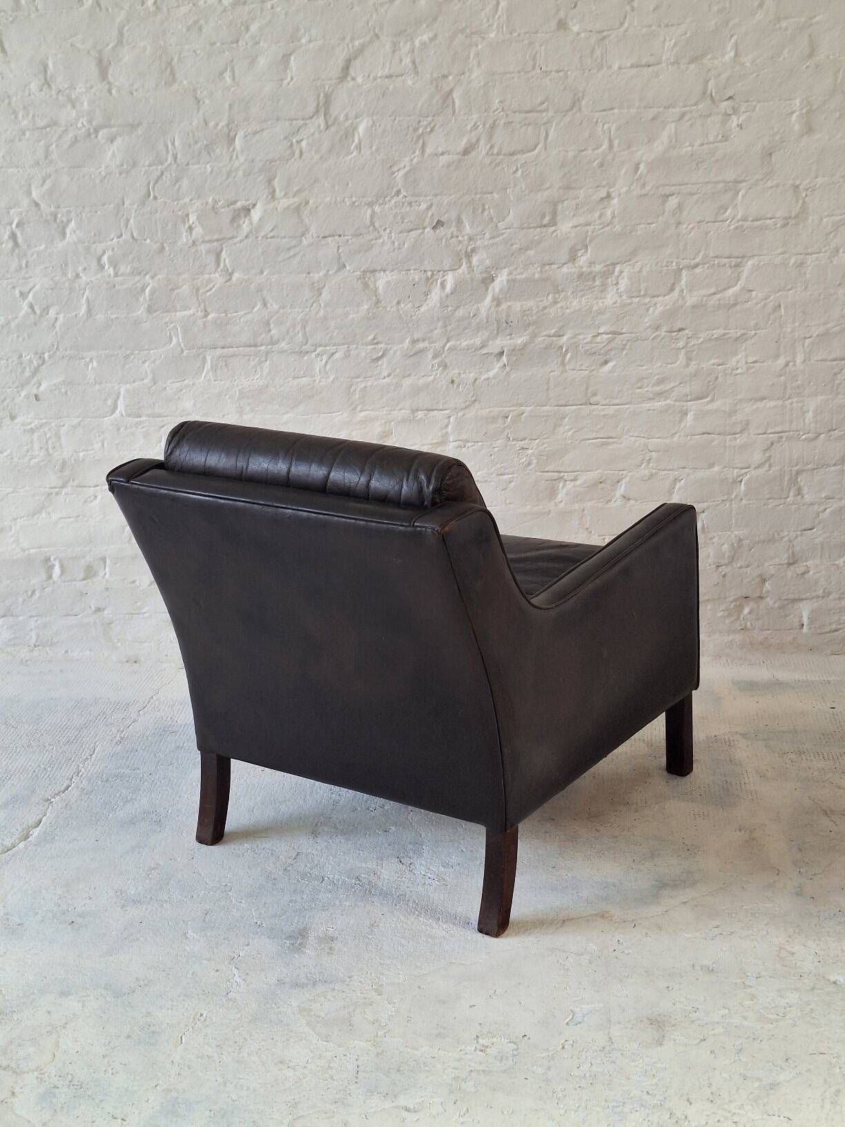 Danish mid century dark brown leather lounge chair, 1960s