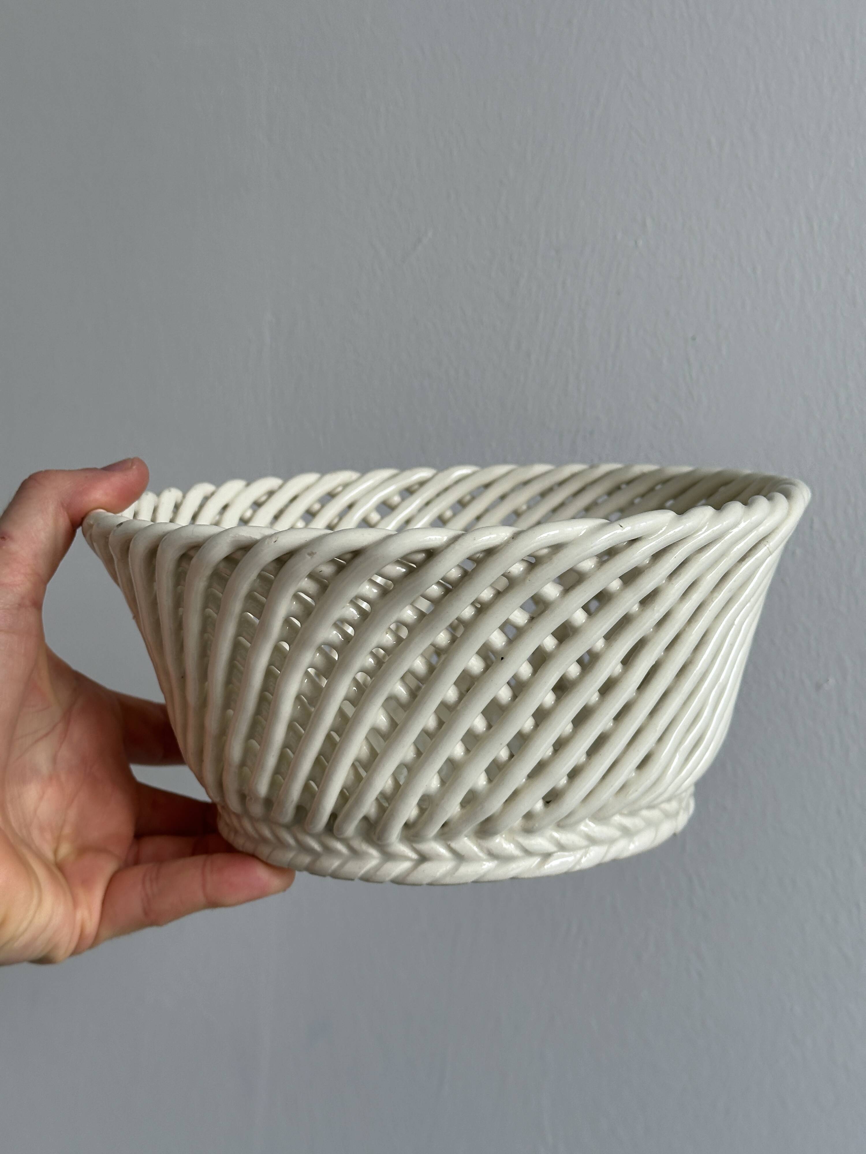 Bread basket - openwork white ceramic bowl.