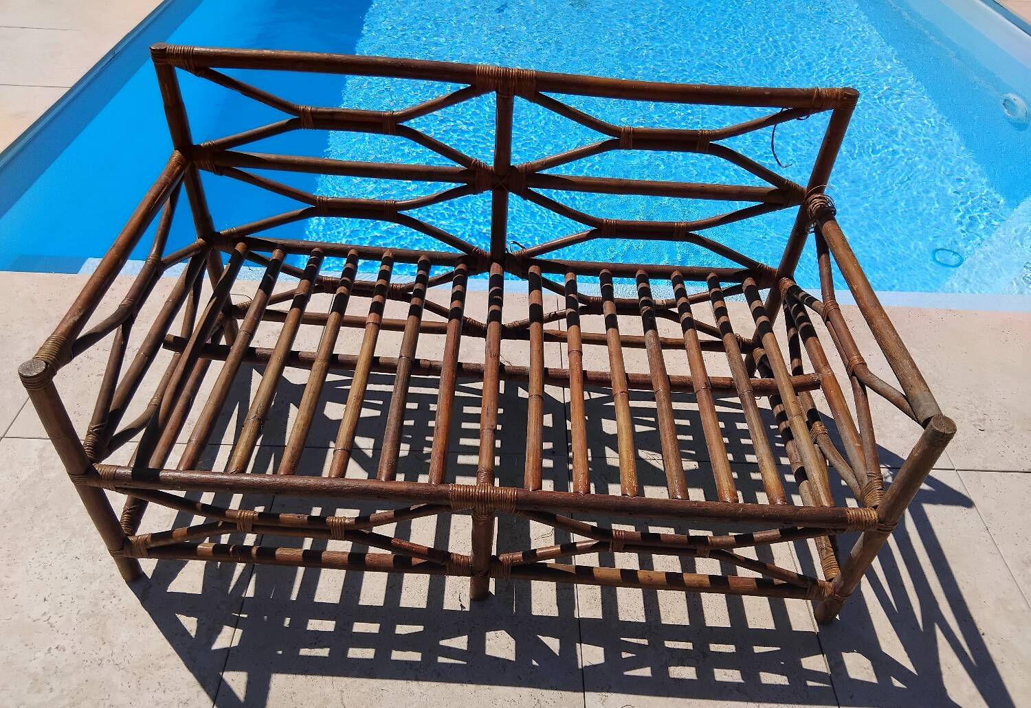 Vintage wooden garden furniture set with a bench and an armchair