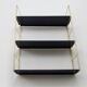 Vintage black and gold String design shelf. 60s