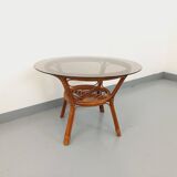 Vintage round smoked glass and rattan coffee table from the 70s