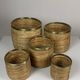 Set of 5 rattan pencil reed and brass plant holder baskets, Italy 1970s
