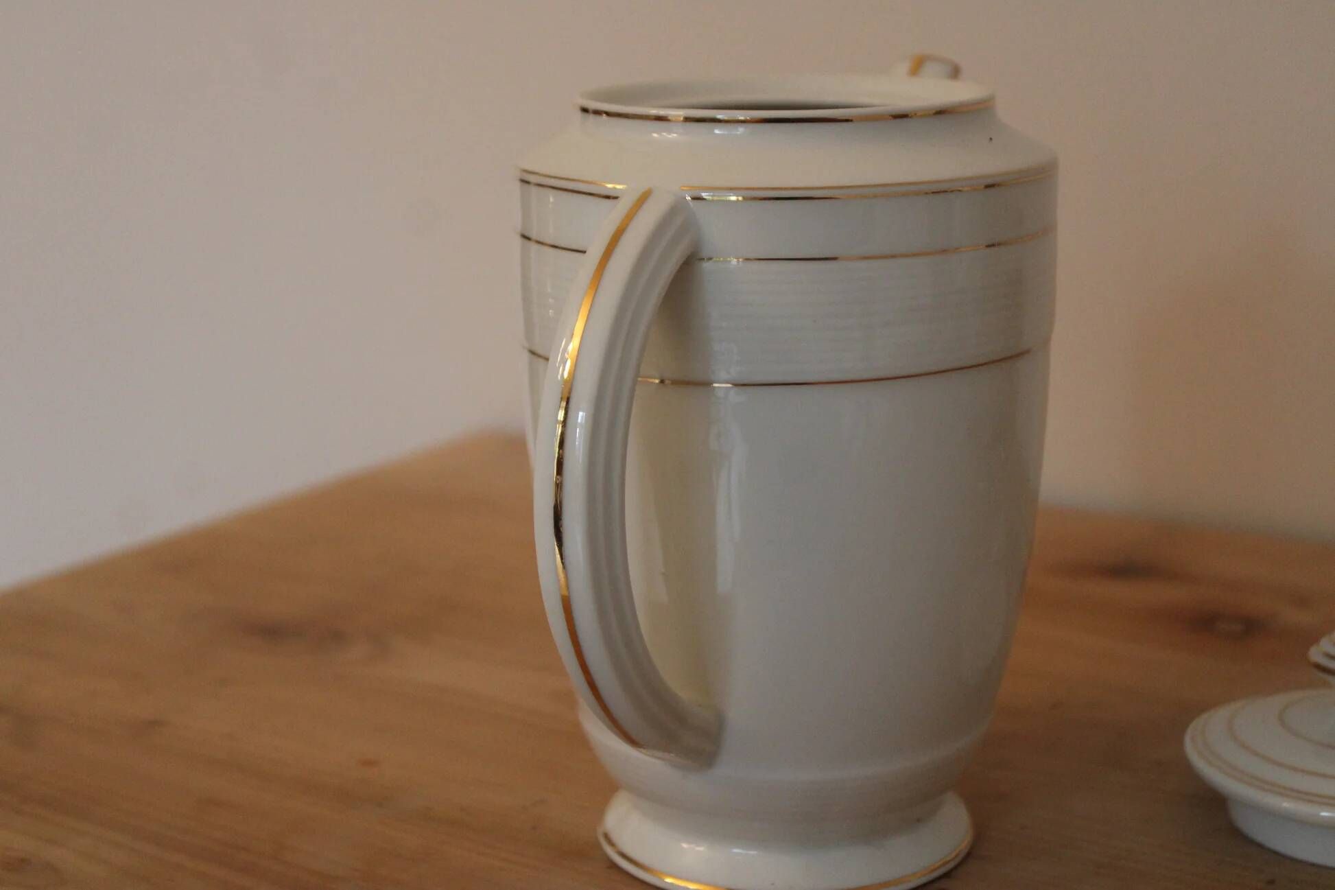 Vintage Art Deco coffee pot in Limoges porcelain by Charles Ahrenfeldt – gold trim.