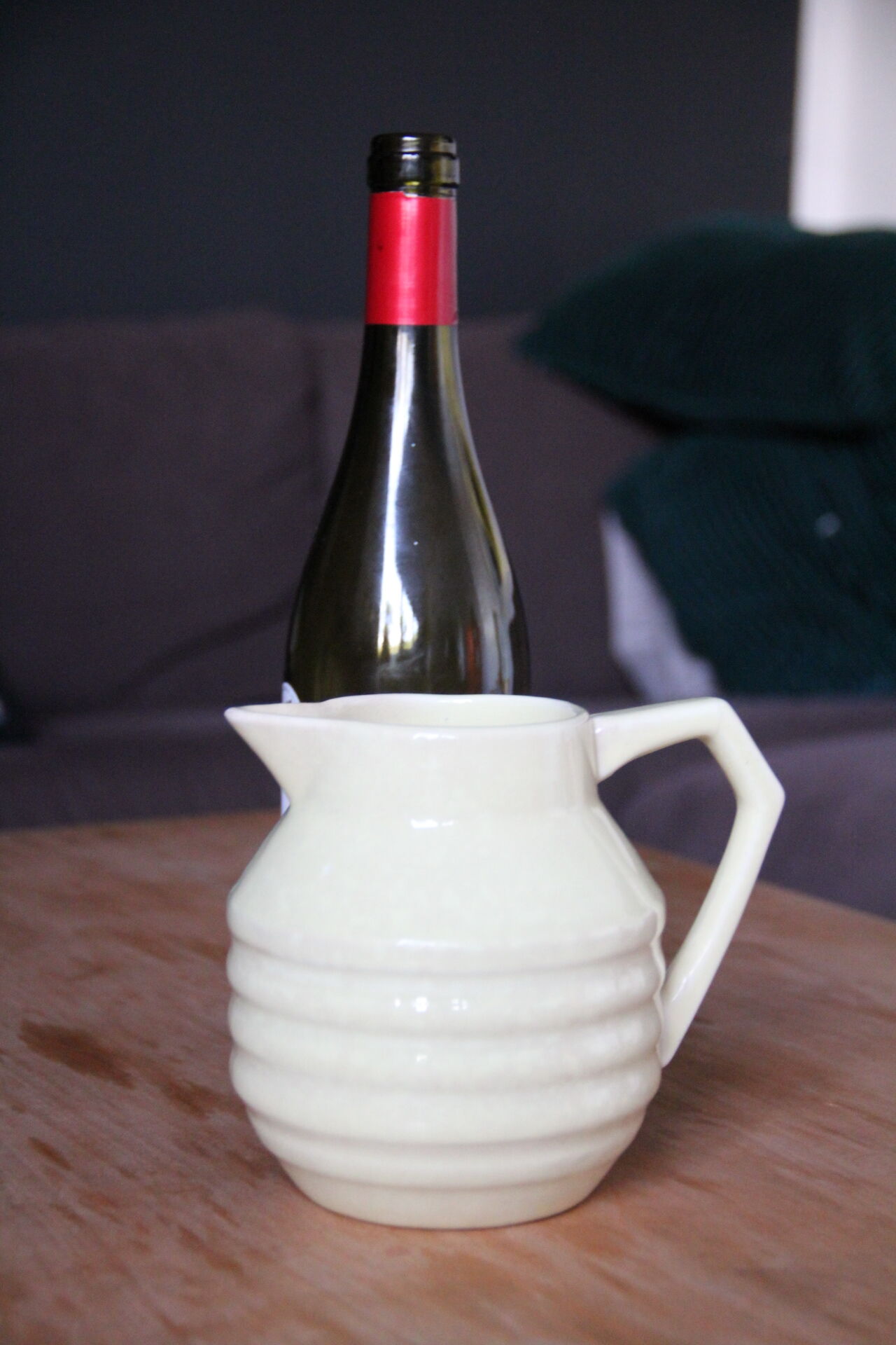 Art-deco pitcher in pale yellow earthenware