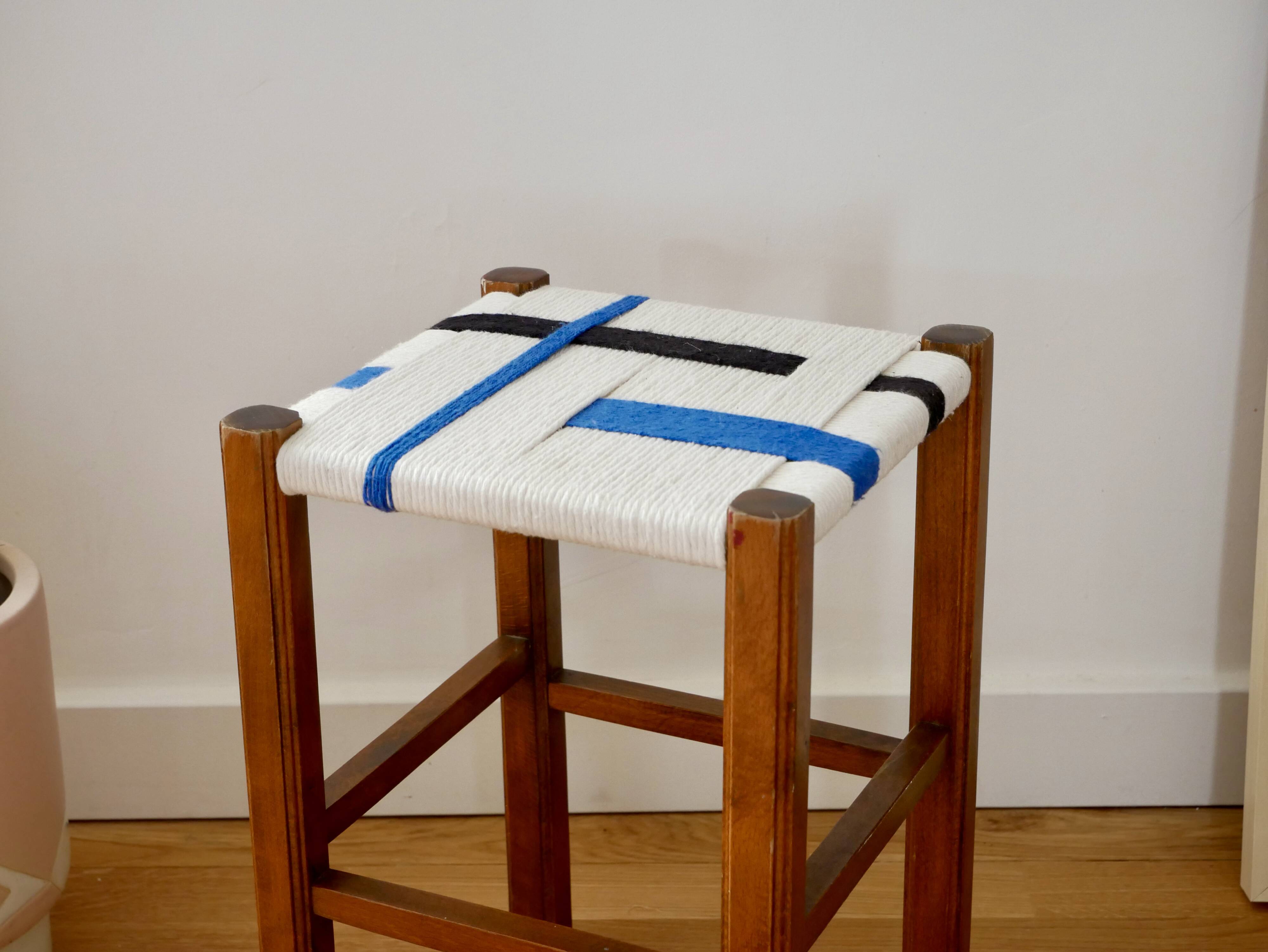 Wooden stool. Vintage stool. woven stool