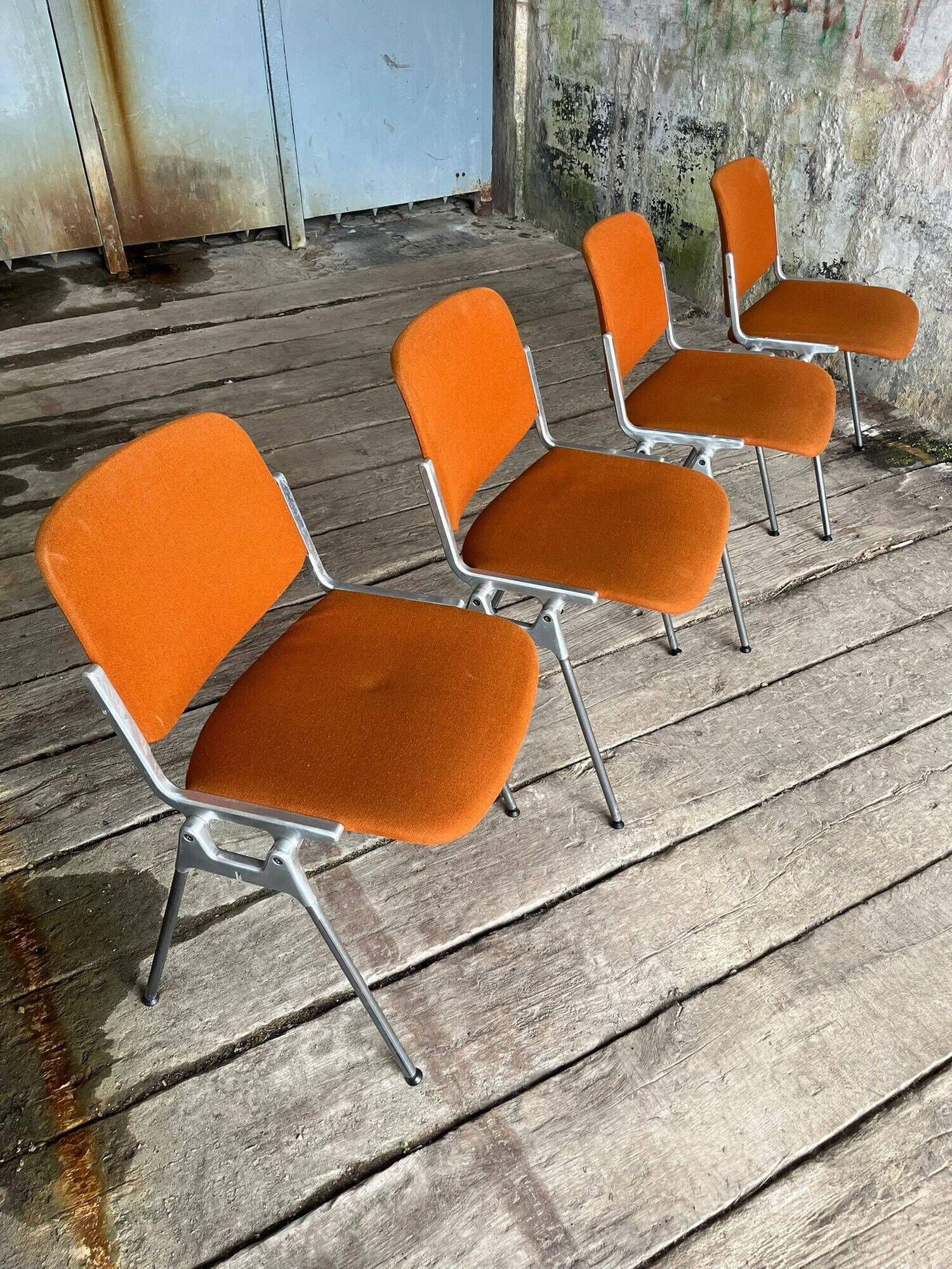 DSC 106 chair in orange by Giancarlo Piretti for Castelli, 1970s.