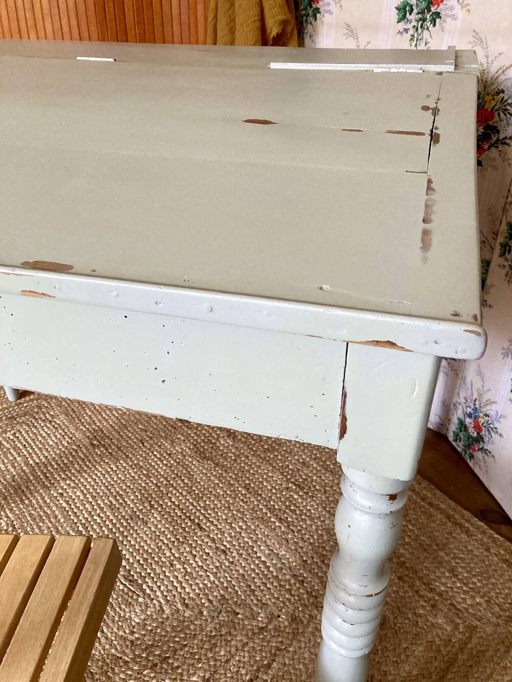 Antique wooden sloped desk, with a drop-down front and turned legs.