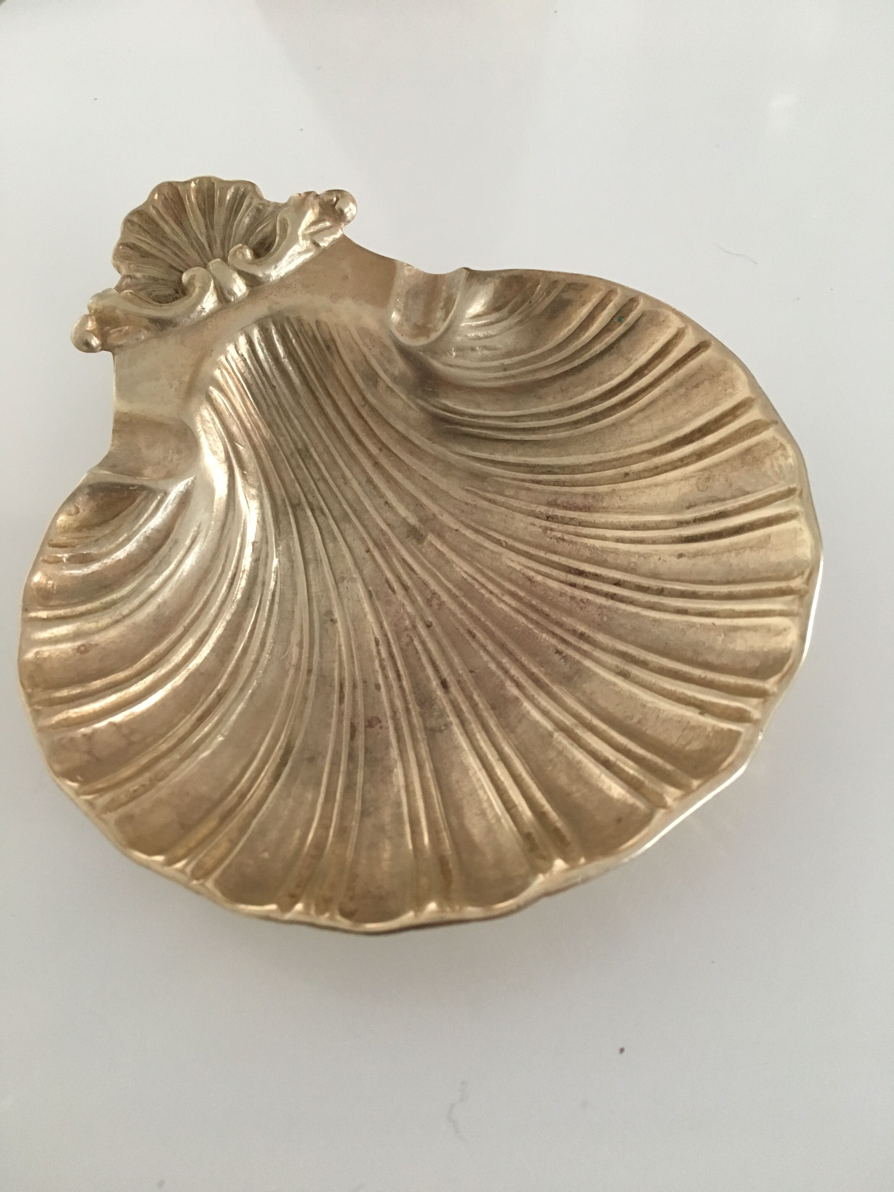 St. James shell ashtray in golden brass