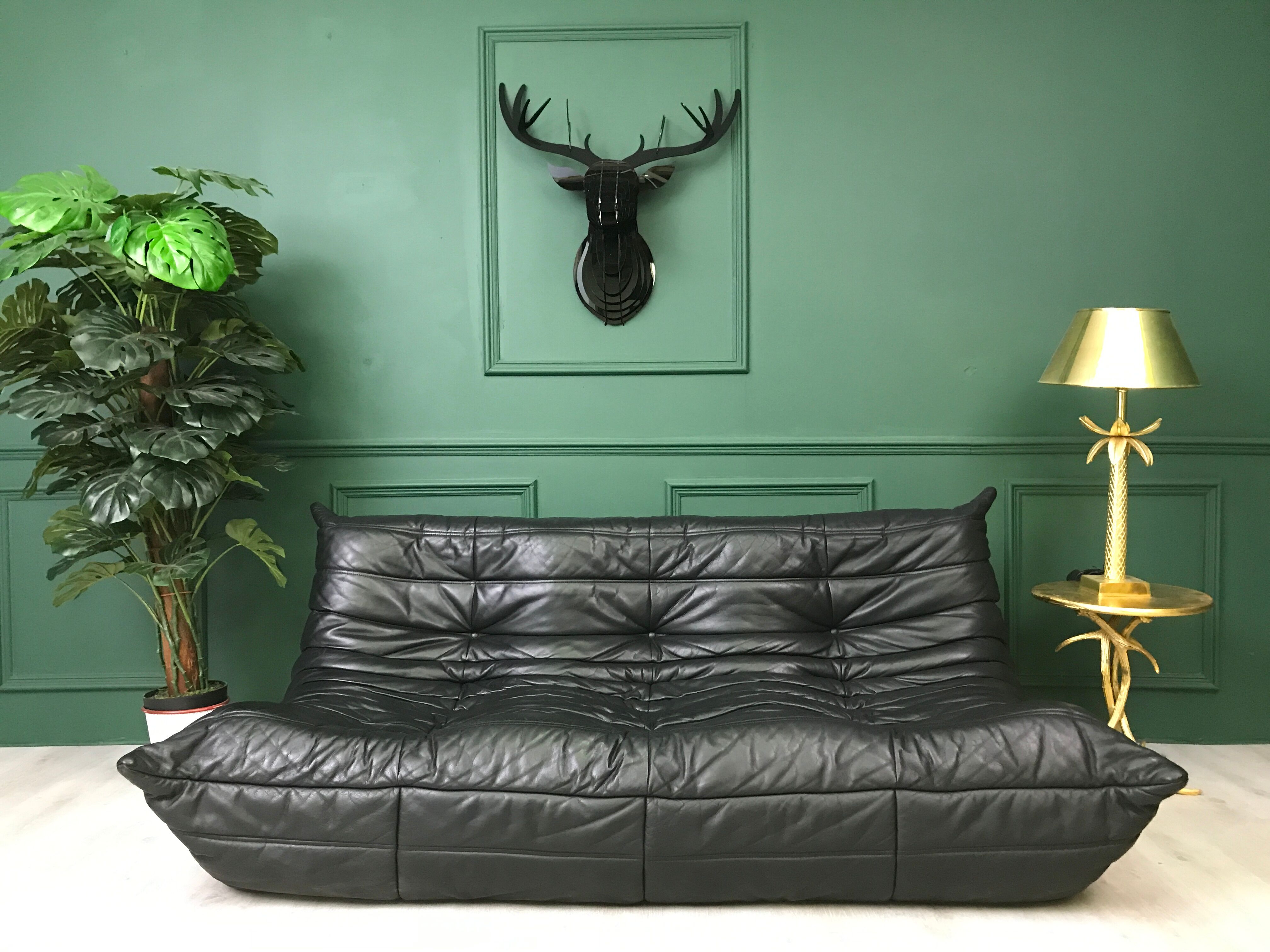 Black leather three seater sofa Togo by Ligne Roset
