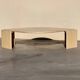 Large designer coffee table in travertine, eye shape, Roche Bobois edition from the 80s
