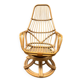 swivel rattan armchair from the 80s