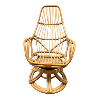 swivel rattan armchair from the 80s