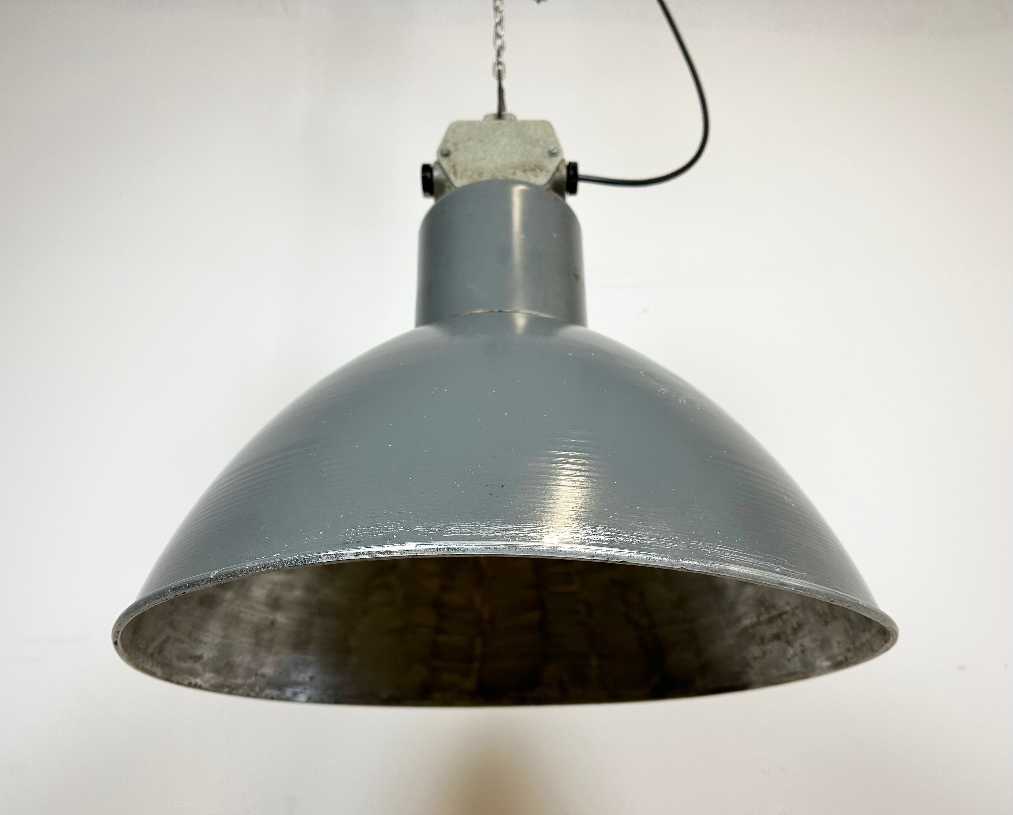 Grey industrial aluminium pendant lamp from polam wilkasy, 1960s