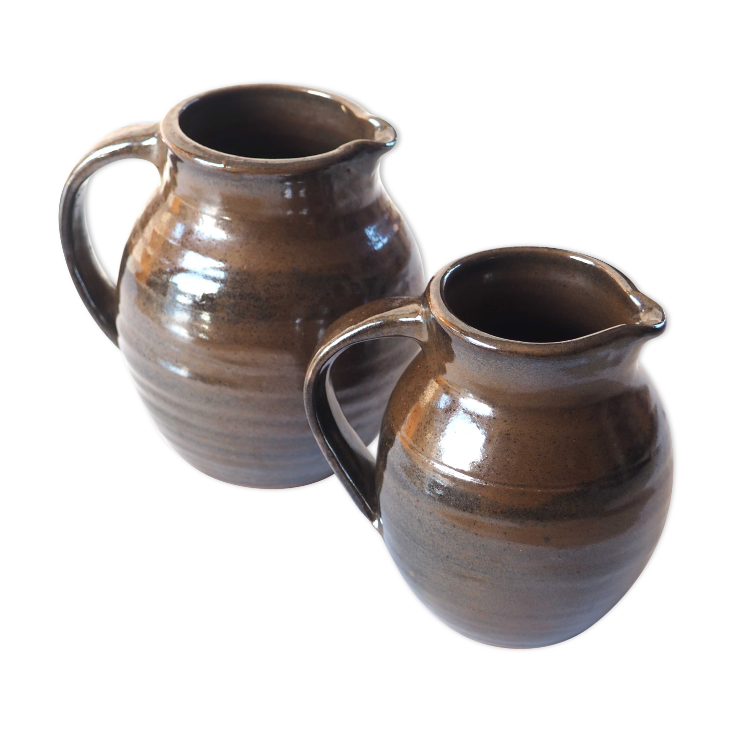 Duo of sandstone pitchers
