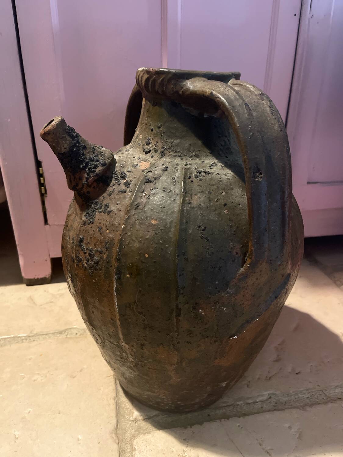 Antique jug with a very patina