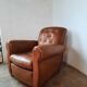 Ancien fauteuil club en cuir, vers 1940 style art déco