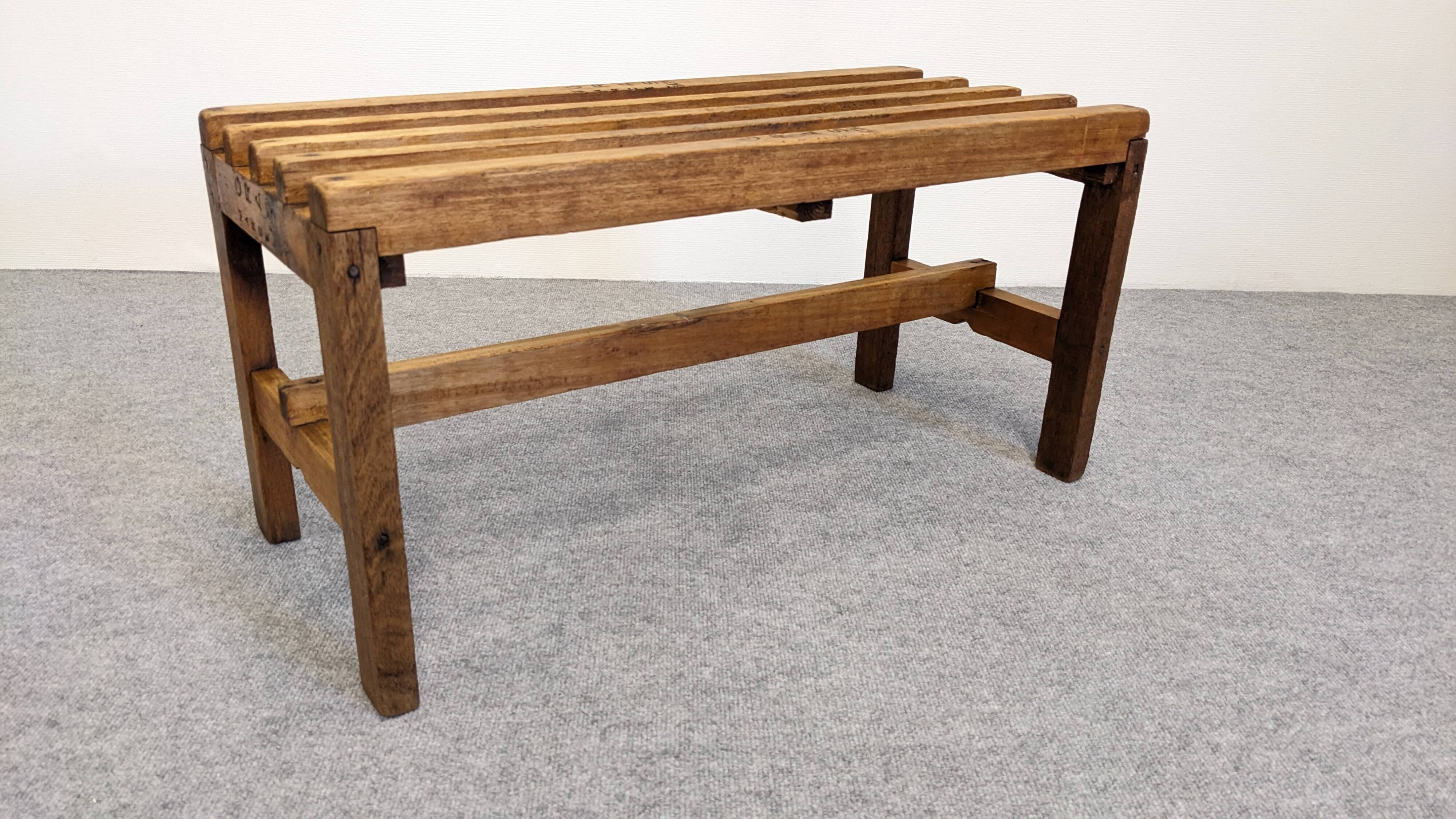Wooden slatted display bench or support, France circa 1960.