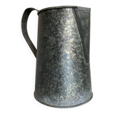 Old garden pitcher vase in folded zinc